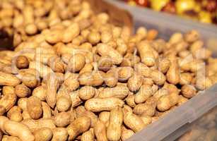 Crate of organic peanuts still in a shell