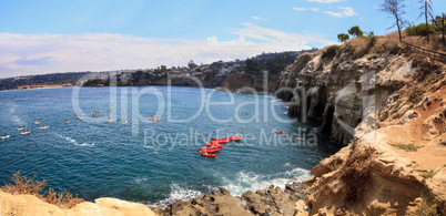 Kayaks near coastal caves at La Jolla Cove