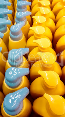 Color plastic bottles with lids in a row.