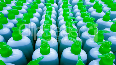 Color plastic bottles in a row.