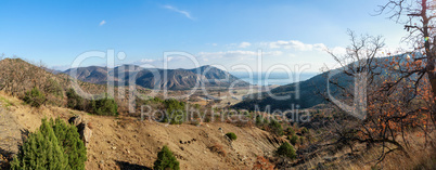 Mountain plateau in the background of the cloudy sky