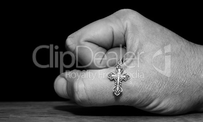 Hand with a cross