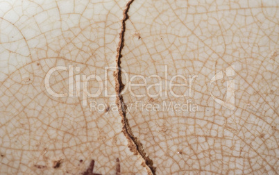 cracked brown ceramic texture background