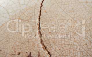 cracked brown ceramic texture background