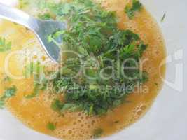 egg yolk with parsley in bowl