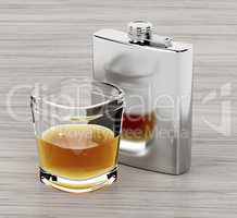 Hip flask and a glass of brandy