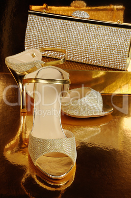 A pair of gold shoes