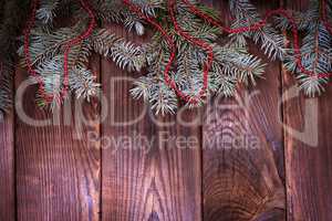 green spruce branch with Christmas decor