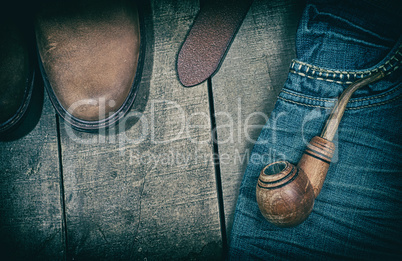 Casual clothing on a wooden background, vintage toning