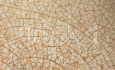 cracked brown ceramic texture background