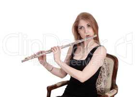 Close up of woman playing the flute