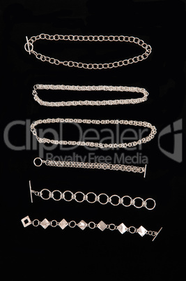 Display of silver necklace and bracelets