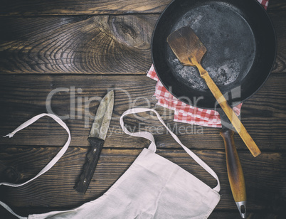 empty black cast-iron frying pan