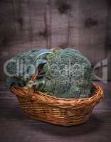 fresh broccoli in a brown wicker basket