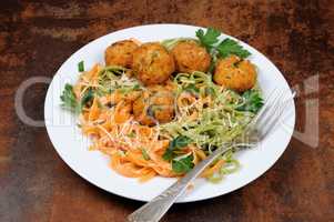 Spaghetti with cheese and meatballs