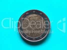 Two Euros coin, European Union over green blue