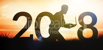 Composite image of businessman using laptop while running