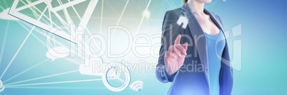 Composite image of mid section of businesswoman using imaginary interface