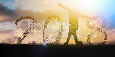 Composite image of silhouette of soccer player making tricks with ball