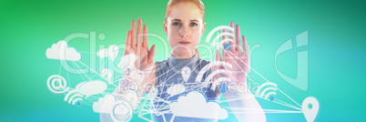 Composite image of portrait of serious businesswoman showing stop gesture