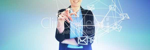 Composite image of mid section of smiling businesswoman pointing