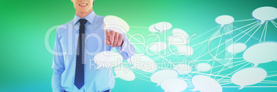 Composite image of mid section of smiling businessman using interface while standing with hand in po