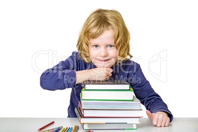 Girl with a stack of books and crayons