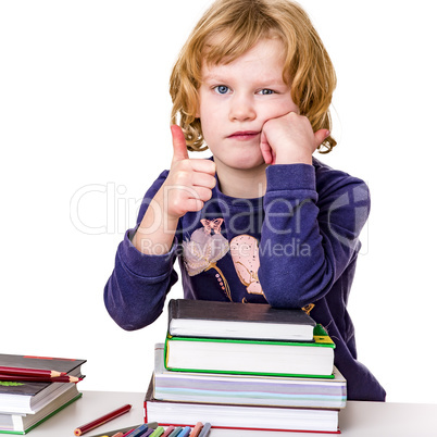 Girl with a stack of books and crayons