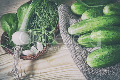 Cucumbers, greens and onions.