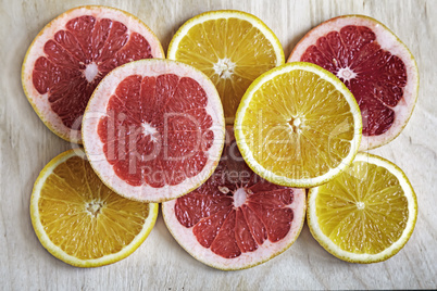 Sliced orange and grapefruit closeup.