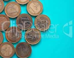 Euro coins, European Union over green blue with copy space