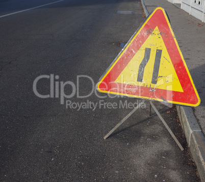 road narrows sign with copy space