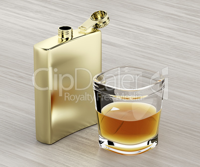 Hip flask and a glass of whiskey