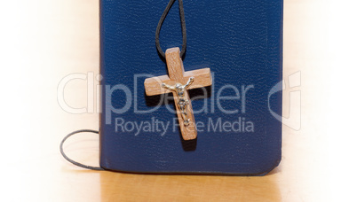 Book and a wooden cross