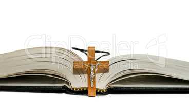 Open book and a cross