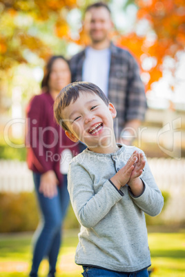 Outdoor Portrait of Happy Mixed Race Chinese and Caucasian Paren