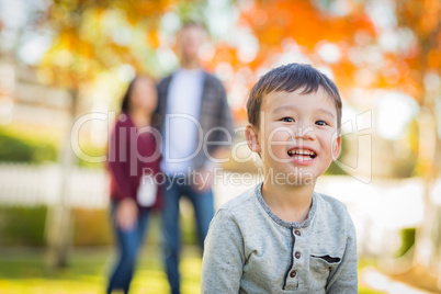 Outdoor Portrait of Happy Mixed Race Chinese and Caucasian Paren