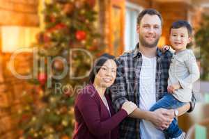 Mixed Race Chinese and Caucasian Parents and Child Indoors In Fr