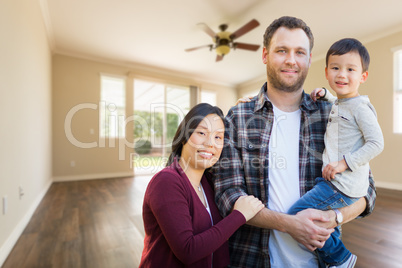 Mixed Race Chinese and Caucasian Parents and Child Inside Empty