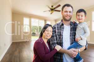 Mixed Race Chinese and Caucasian Parents and Child Inside Empty