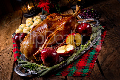 Roast Christmas duck with apples