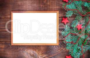 empty wooden frame on a brown wall