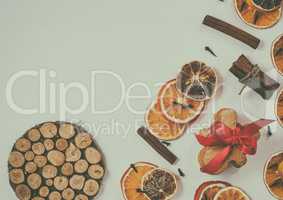 white wooden festive background with slices of dried fruits and