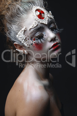 Young girl with a white hair and creative makeup