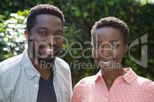 Smiling couple in garden