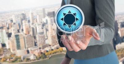 Sun icon and Businesswoman with hand palm open in city office