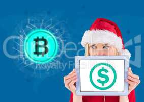 Bitcoin icon and dollar icon with female santa holding tablet