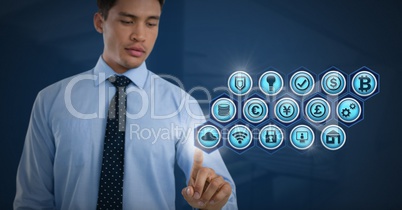 Businessman touching various business icons