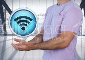 Wi-Fi icon and man with hands palm open in city office