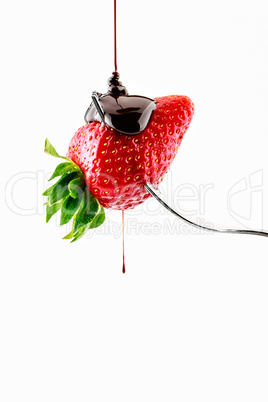 Strawberry with liquid chocolate